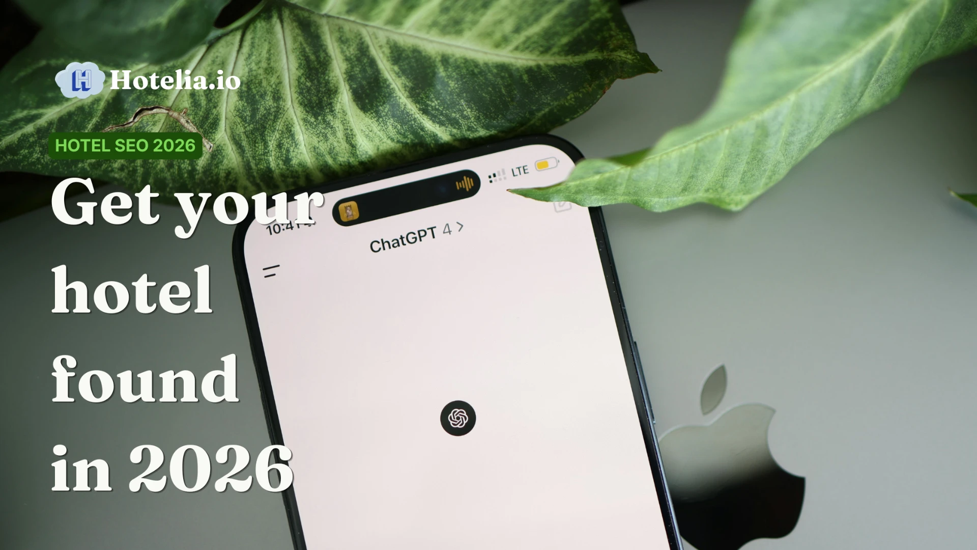 A traveler using ChatGPT on a phone to find a hotel, illustrating hotel SEO in 2026