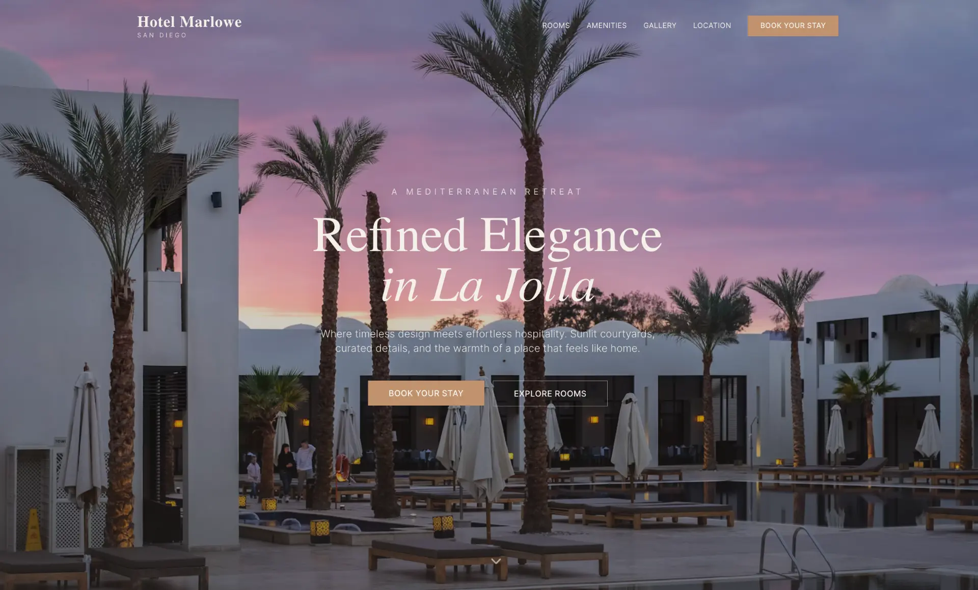 A boutique hotel homepage hero with book your stay buttons in the header and hero section